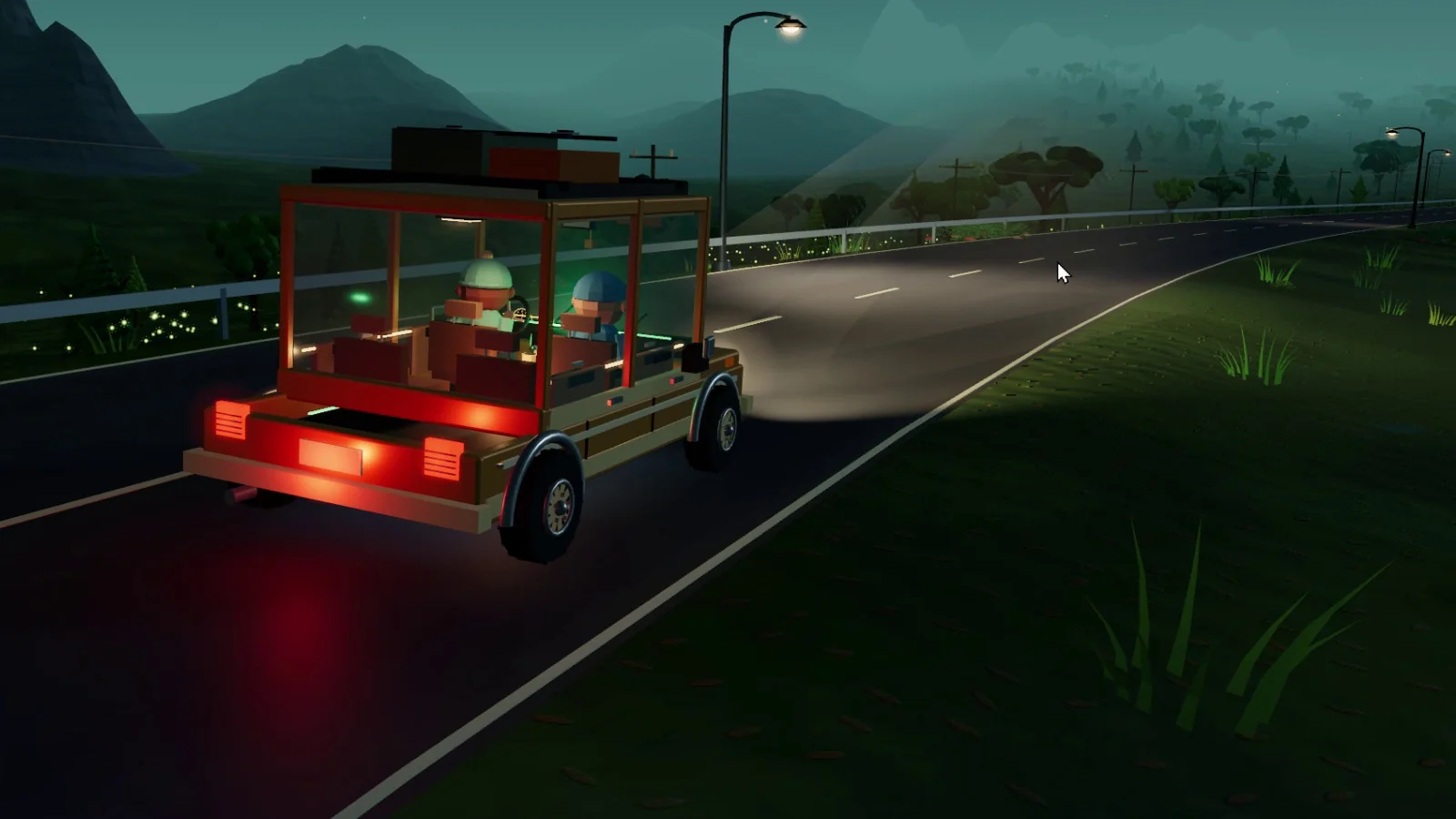Vista del vehículo, la carretera y luces en el paisaje nocturno.